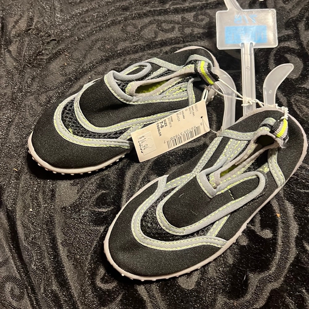 New with tags kids swim shoes.